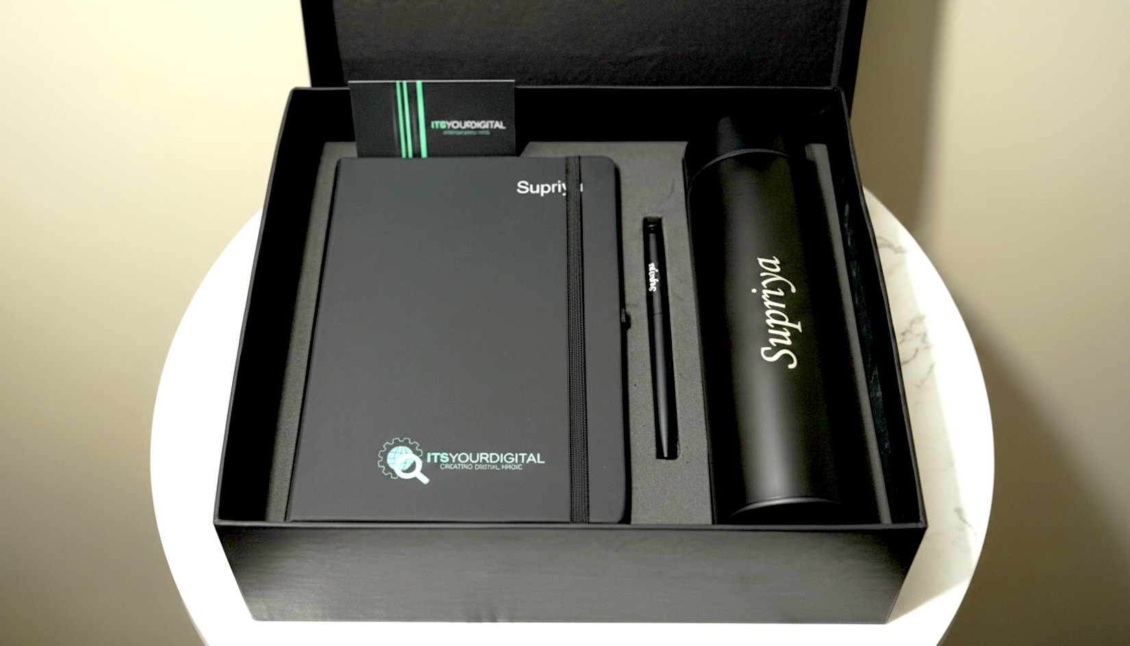 Book pen bootle kit on which Itsyourdigital logo is printed